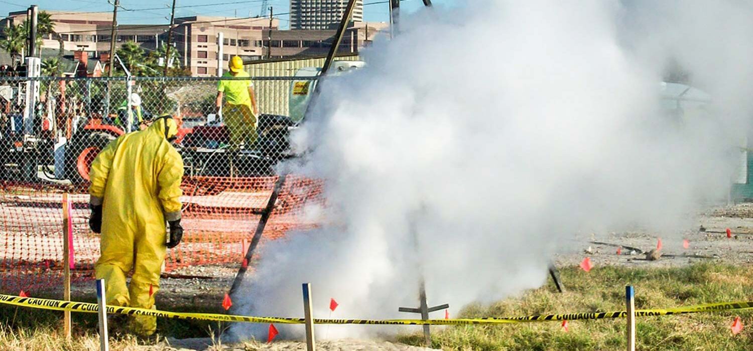 worker in yellow hazmat suit at UT MD Anderson Cancer Center site remediation project